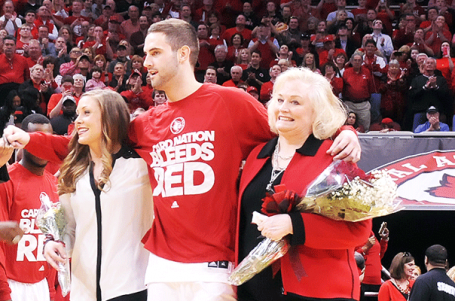 Luke Hancock is escorted by family and friends for his final game at the KFC Yum! Center.