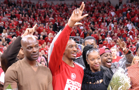 Russ Smith with his dad (left) and other family members.
