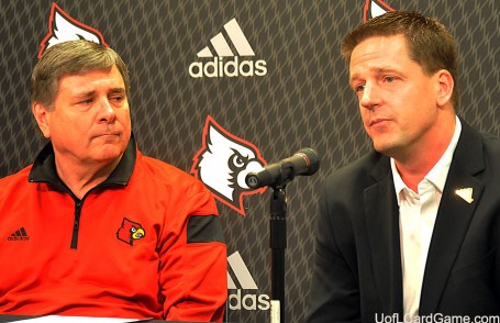 Tom Jurich, of the University of Louisville, and Chris McGuire, of Adidas, announce $40 million deal.