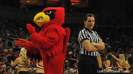 Susan Blauch, an ACC official, appears a bit skitish about the Cardinal Bird durng a break in the UofL-NC State game.