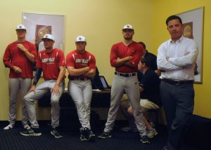 Former UofL baseball player Mark Jurich joins current players for the press conference.
