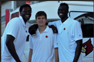 Mangok Mathiang, David Levitch and Deng Adel were with the UofL basketball team at the service.